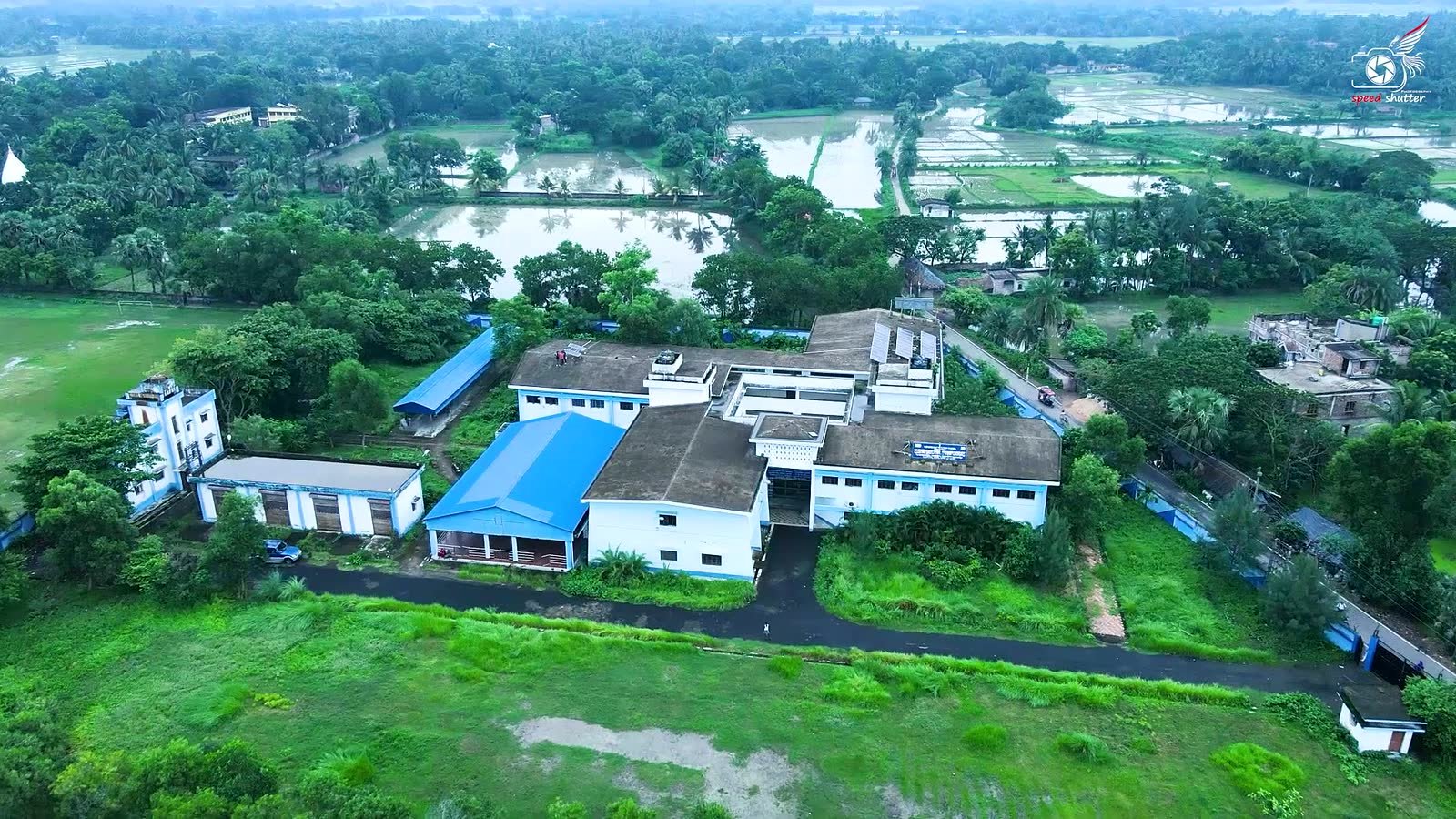 Aerial view of the Government ITI Canning-I campus showing the workshop block with rooftop solar panels